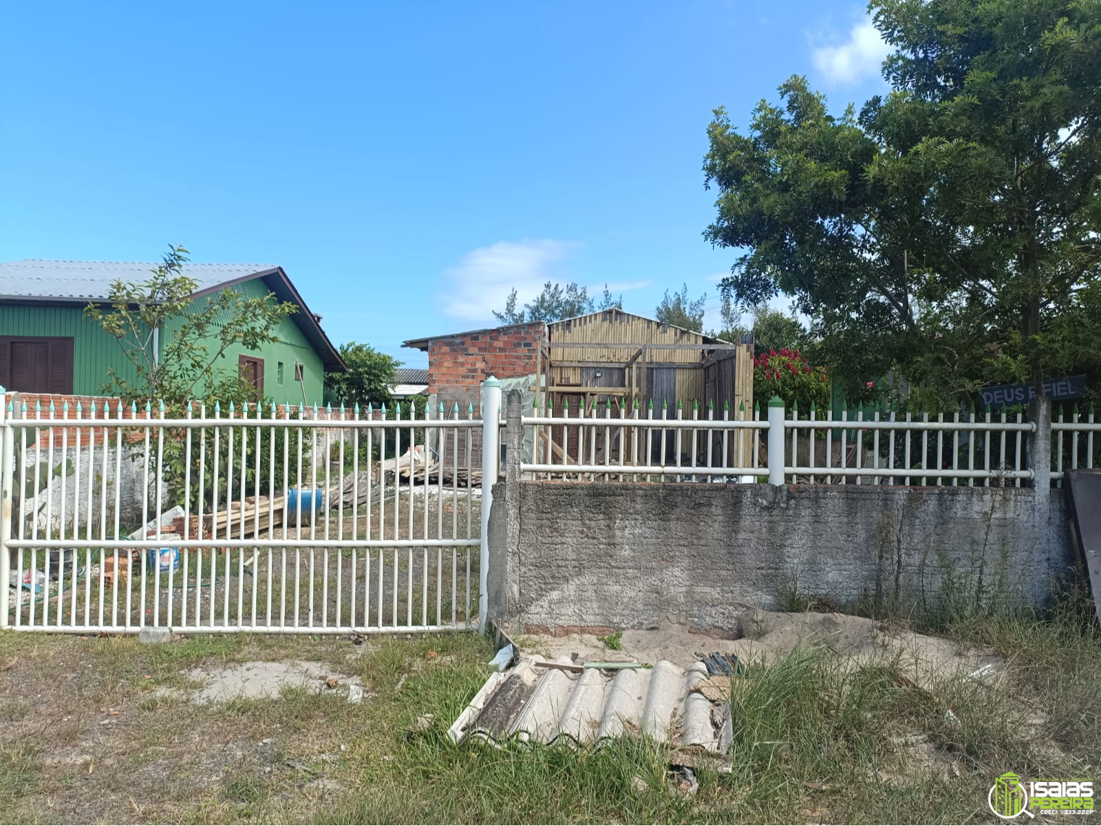 Terreno com casa